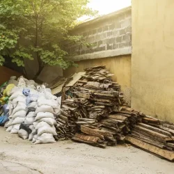 construction-garbage-apartment-repair-pile-construction-waste-white-bags-old-wooden-floor-boards-near-wall-158636778